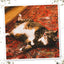 Tabby cat lounging on a rug with an open mouth, playfully licking and enjoying its relaxation time.