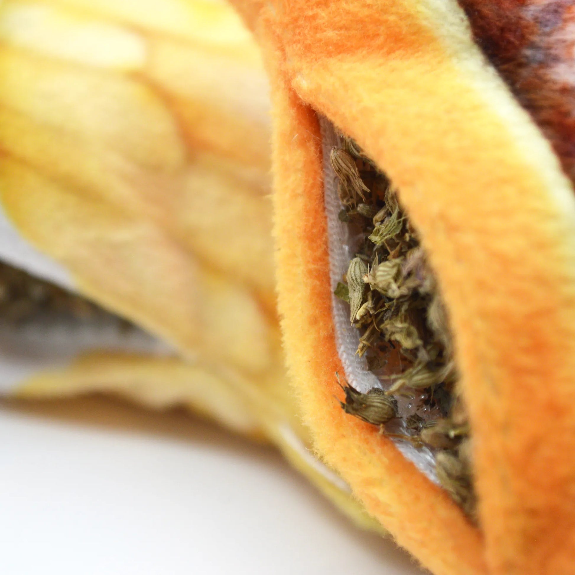 Close-up of catnip-filled pocket in the Meowijuana fries cat toy.